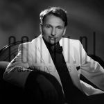 28-04-2004 Dick Cohen in Amsterdam, by order of Stage-entertainment. April 28, 2004.

[keywords]Posed, Black & White Image, Smiling, Suit[/keywords]